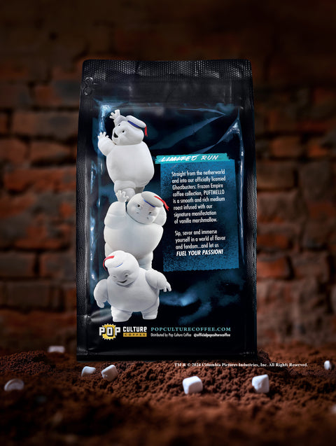 A 12oz bag of Ghostbusters Puftmello coffee, featuring collectible Mini Puft-themed artwork.