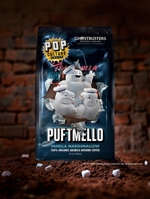 A 12oz bag of Ghostbusters Puftmello coffee, featuring collectible Mini Puft-themed artwork.