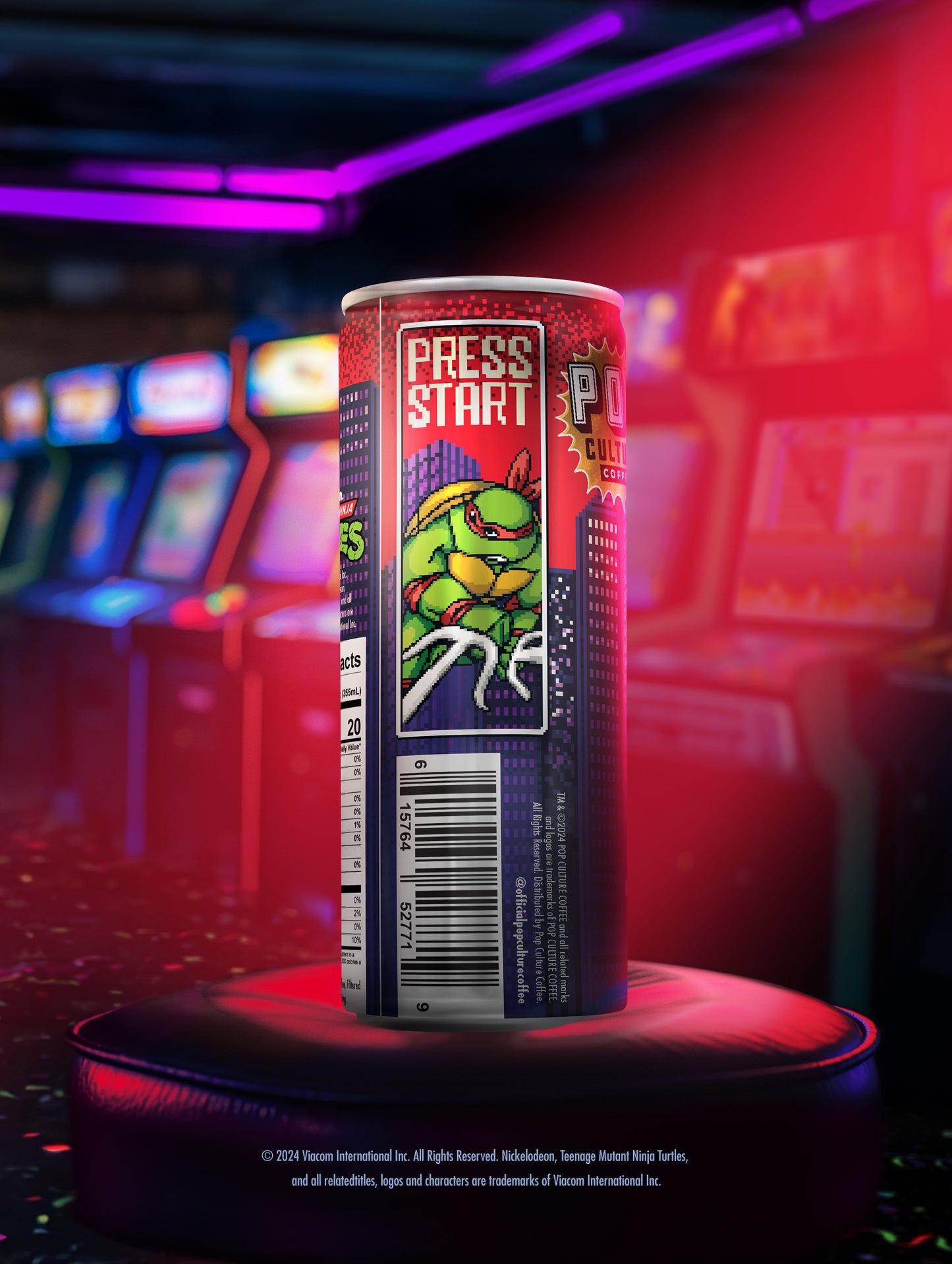A close-up of a single can showing the retro arcade-style artwork of Raphael holding his twin sai.