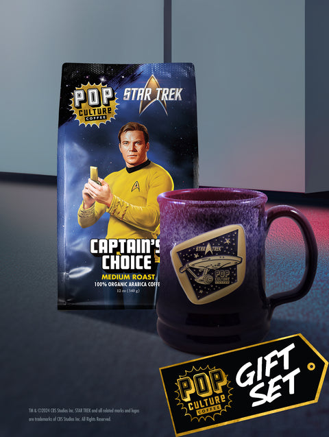 The Star Trek: Enterprise gift set, showing the handcrafted Enterprise mug with its midnight plum glaze next to a bag of Captain's Choice coffee.
