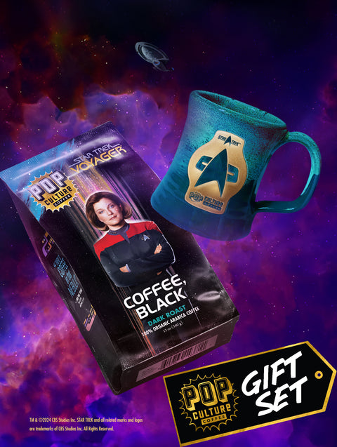 The Star Trek: Voyager gift set, showing the handcrafted Voyager mug next to a bag of Coffee Black dark roast.