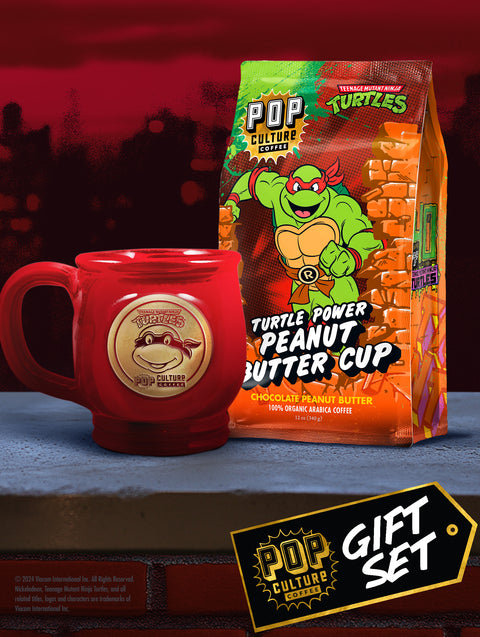 The Teenage Mutant Ninja Turtles Raphael gift set, featuring the red handthrown mug and a bag of Turtle Power Peanut Butter Cup coffee.