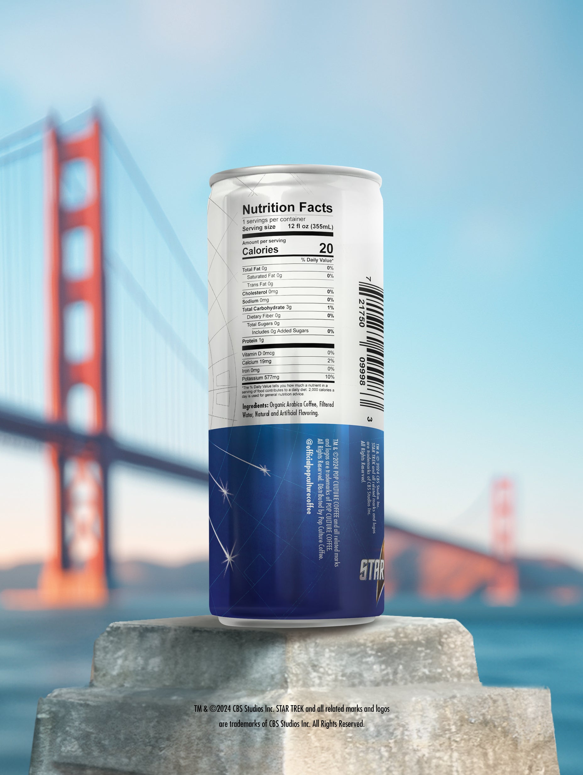 A close-up of a single can of Federation Roast cold brew, showing the detailed artwork of the U.S.S. Enterprise soaring through the stars.