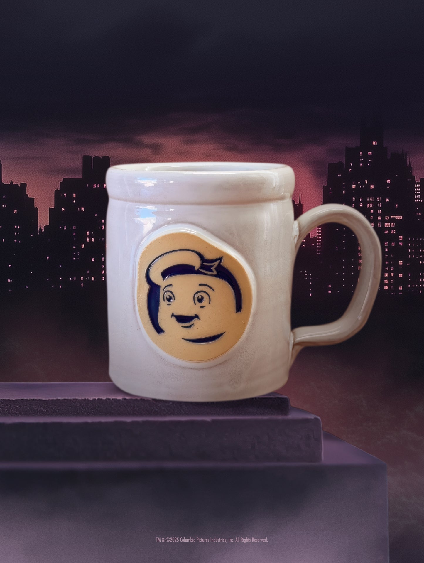 The official Ghostbusters Mini Puft handthrown mug by Deneen Pottery, featuring a smooth white glaze.